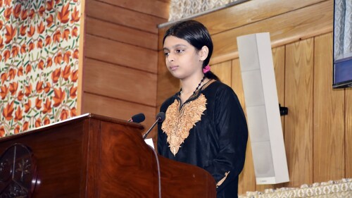 In this handout photo released by Press Information Department Pakistan controlled Kashmir, Razia Sultan, 11, the daughter of Mohammed Yasin Malik, 57, speaks in the regional legislative assembly in Muzaffarabad, the capital of Pakistan-administered Kashmir, Thursday, July 20, 2023. The eleven-year-old daughter of a prominent Kashmiri rebel leader who was sentenced to life in prison in neighboring India on Thursday issued an emotional appeal, urging New Delhi to allow her to meet her ailing father. (Press Information Department Pakistan controlled Kashmir via AP)
