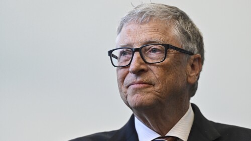 FILE - Bill Gates reacts during a visit with Britain's Prime Minister Rishi Sunak at the Imperial College University, in central London, on Feb. 15, 2023. Microsoft Corp. co-founder Gates says he is in Beijing, joining a series of foreign business figures who have visited China as the ruling Communist Party tries to revive investor interest in the country. (Justin Tallis/Pool Photo via AP, File)