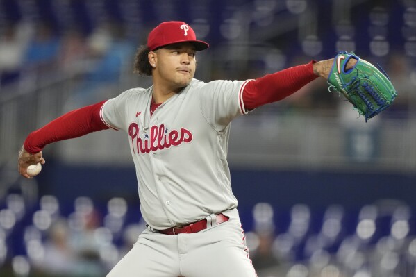 Philadelphia Phillies starting pitcher Taijuan Walker throws during the first inning of a baseball game against the Miami Marlins, Monday, July 31, 2023, in Miami. (AP Photo/Lynne Sladky)