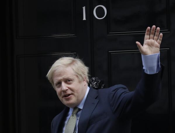 FILE - Britain's Prime Minister Boris Johnson returns to 10 Downing Street after meeting with Queen Elizabeth II at Buckingham Palace, London, on Friday, Dec. 13, 2019. Former U.K. Prime Minister Johnson says he’s quitting as a lawmaker after being told he will be sanctioned for misleading Parliament. Johnson quit on Friday, June 9, 2023 after receiving the results of an investigation by lawmakers over misleading statements he made to Parliament about a slew of gatherings in government that breached pandemic lockdown rules.(AP Photo/Matt Dunham, File)