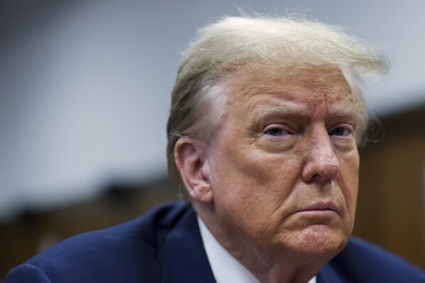 Republican presidential candidate and former President Donald Trump sits in the courtroom at his criminal trial at Manhattan state court in New York, Monday, April 22, 2024. (Brendan McDermid/Pool Photo via AP)