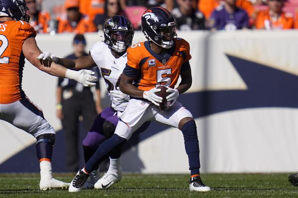 Broncos overcome Teddy Bridgewater's injury with stiff defense to