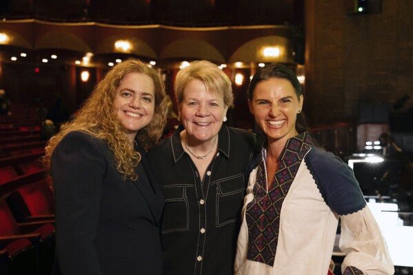 This image released by the Metropolitan Opera shows conductors Speranza Scappucci, from left, Marin Alsop and Oksana Lyniv at the Metropolitan Opera House in New York in April 2024. (Muriel Steinke/Metropolitan Opera via AP)