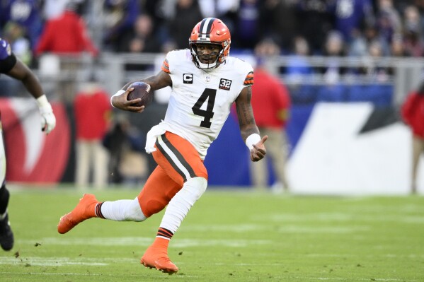 FILE - Cleveland Browns quarterback Deshaun Watson (4) plays during the second half of an NFL football game against the Baltimore Ravens, Sunday, Nov. 12, 2023, in Baltimore. Browns quarterback Deshaun Watson will miss the rest of this season after breaking a bone in his right shoulder in Sunday's win over Baltimore — his signature game in two seasons. (AP Photo/Nick Wass, File)