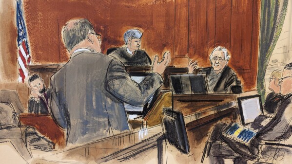 In this courtroom sketch, Robert De Niro, seated background right, is questioned by his attorney Laurent Drogin, foreground, with Judge Lewis J. Liman presiding, background center, in Manhattan federal court, Tuesday, Oct. 31, 2023, in New York. The jury is seated at right. (Elizabeth Williams via AP)