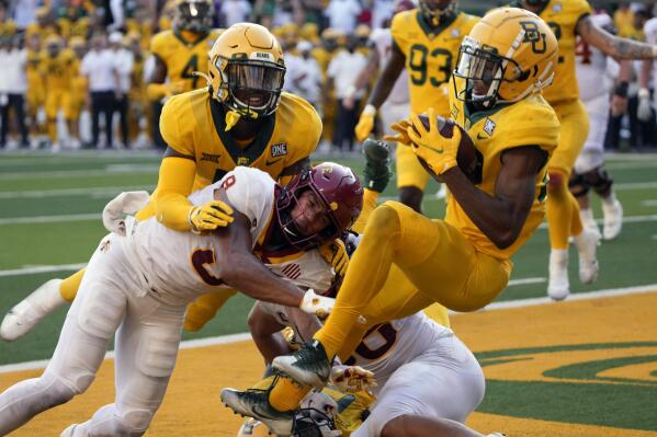 Baylor safety JT Woods (22) intercepts the ball in the end zone on a two-point conversion attempt by Iowa State during the second half of an NCAA college football game, Saturday, Sept. 25, 2021, in Waco, Texas. Baylor won 31-29. (AP Photo/Jim Cowsert)