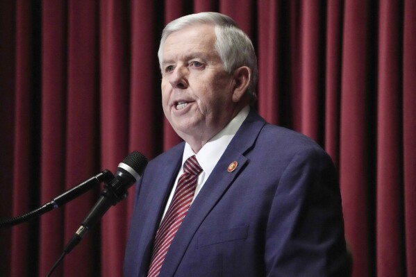 FILE - Missouri Gov. Mike Parson delivers the State of the State address on Jan. 18, 2023, in Jefferson City, Mo. Parson on Friday, June 30, 2023, signed a close to $52 billion state budget that includes billions of dollars in funding to expand Interstate 70 across the state but also cuts roughly $555 million in spending that lawmakers wanted. (AP Photo/Jeff Roberson, File)