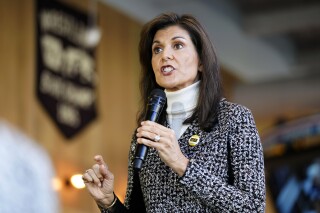 Republican presidential candidate Nikki Haley speaks during a campaign stop, Saturday, Dec. 30, 2023, in Coralville, Iowa. Haley is eligible for the presidency, despite claims otherwise on social media. (AP Photo/Charlie Neibergall)