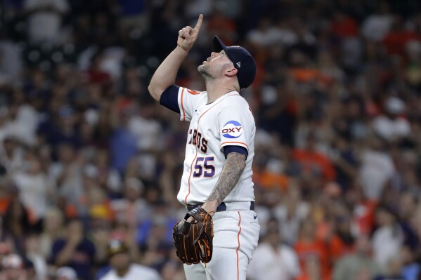 Houston Astros closing pitcher Ryan Pressly reacts after striking out Oakland Athletics' Brent Rooker to end the baseball game Wednesday, Sept. 13, 2023, in Houston. The Astros had a combined no-hitter through eight innings, but Pressly gave up two runs on two hits in the ninth. (AP Photo/Michael Wyke)