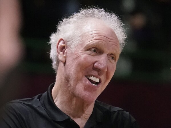 FILE - Basketball Hall of Fame legend Bill Walton laughs during a practice session for the NBA All-Star basketball game in Cleveland, Feb. 19, 2022. Walton, who starred for John Wooden's UCLA Bruins before becoming a Basketball Hall of Famer and one of the biggest stars of basketball broadcasting, died Monday, May 27, 2024, the league announced on behalf of his family. He was 71. (AP Photo/Charles Krupa, File)