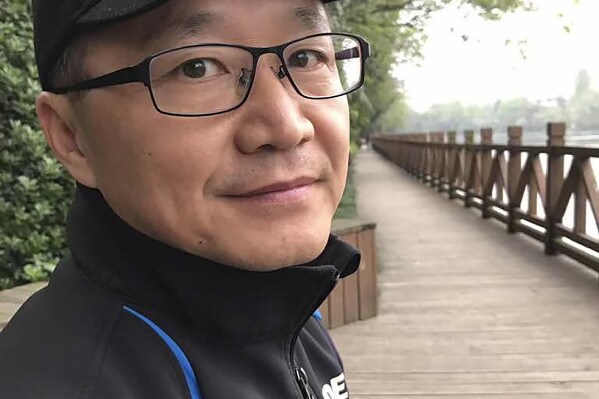 In this Dec. 15, 2018 photo provided by Ge Yunxia, church elder Ding Zhongfu visits a park in Hefei city, in central China's Anhui province. Ding and four other people, all senior in the Ganquan church were detained by police in November on suspicion of fraud, according to a bulletin from the church. (Ge Yunxia via AP)