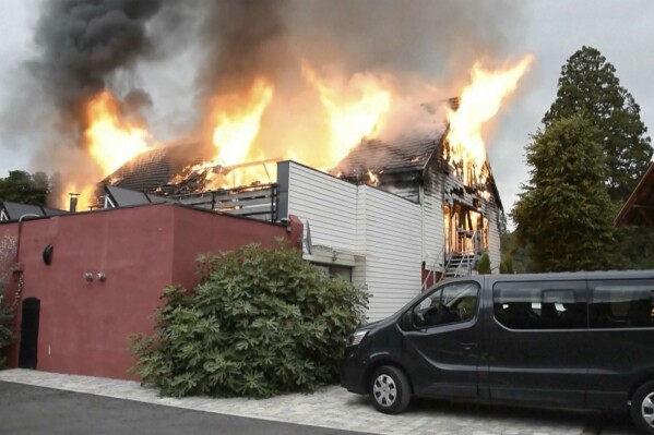 Fire rages at a vacation home in the town of Wintzenheim, north-eastern France, Wednesday Aug. 9, 2023. A fire ripped through a vacation home for adults with disabilities in eastern France on Wednesday, killing several people, the head of rescue operations said. (TNN/dpa via AP)