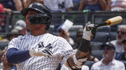New York Yankees' Gleyber Torres watches his two run homer in the first inning of a baseball game against the Baltimore Orioles, Tuesday, July 4, 2023, in New York. (AP Photo/Bebeto Matthews)