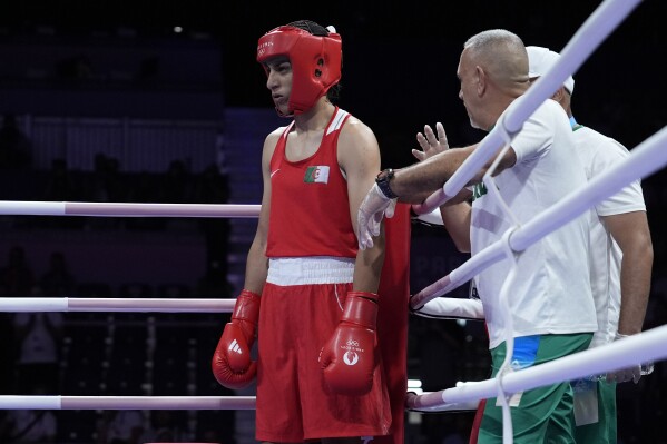 Algeria's Imane Khelif prepares to fight Italy's Angela Carini in their women's 66kg preliminary boxing match at the 2024 Summer Olympics, Thursday, Aug. 1, 2024, in Paris, France. (AP Photo/John Locher)