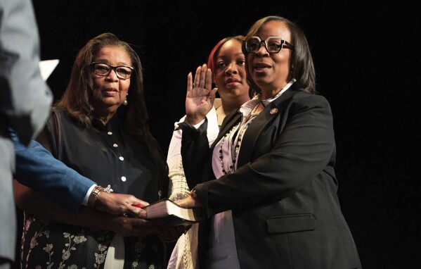 Former 6th District City Councilwoman Sharon Tucker is sworn in as mayor at the Clyde Theatre on Tuesday morning, April 23, 2024, in Fort Wayne, Ind. (Stan Sussina/The Journal-Gazette via AP)