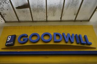 FILE - A Goodwill store sign is shown in Berkeley, Calif., Tuesday, March 9, 2021. Goodwill Industries International Inc., the 120 year-old non-profit organization that operates 3,300 stores in the U.S., and Canada,  has launched an online business, as part of a newly incorporated recommerce venture called GoodwillFinds. (AP Photo/Jeff Chiu, File)