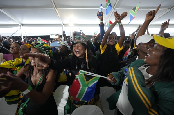 People attend Freedom Day celebrations in Pretoria, South Africa, Saturday April 27, 2024. The day marks April 27 when the country held pivotal first democratic election in 1994 that announced the official end of the racial segregation and oppression of apartheid. (AP Photo/Themba Hadebe)