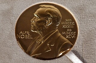 FILE - A Nobel medal is displayed during a ceremony in New York, on Dec. 8, 2020. The Norwegian Nobel Committee said Wednesday, Feb. 28, 2024, that it had registered a total of 285 candidates for the 2024 Nobel Peace Prize by the Feb. 1 deadline, down from 2023 when it received 351 valid nominations. (Angela Weiss/Pool Photo via AP, File)