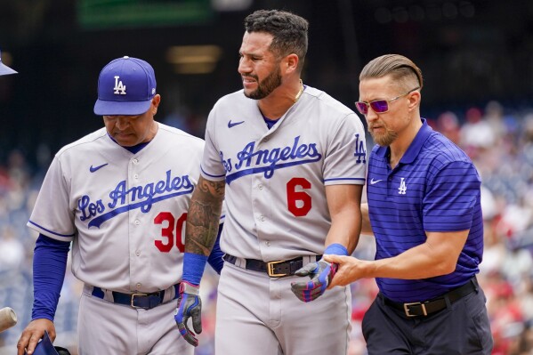 Dodgers outlast rain, defeat Nationals 7-3 to extend NL West lead to 13  games