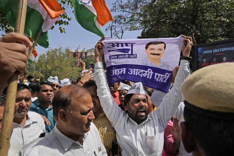 Supporters of the Aam Aadmi Party protest against the arrest of their party leader in New Delhi, India, March 26, 2024. India's ruling Bharatiya Janata Party has brought corruption charges against many officials from opposition parties, but few convictions. (AP Photo/Manish Swarup)