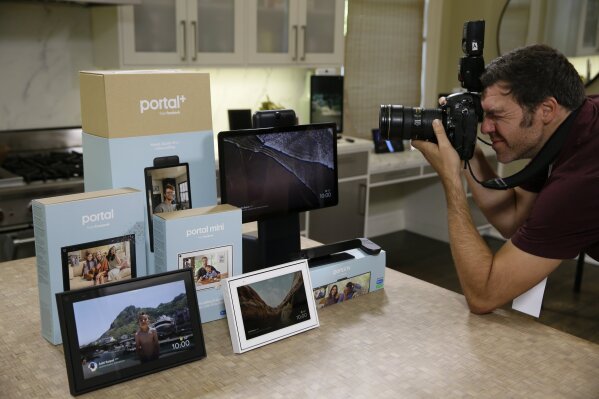 In this photo taken Tuesday, Sept. 17, 2019, new Facebook Portal products are displayed during an event in San Francisco. Facebook is slashing the price and the size of the Portal, its screen and camera-equipped gadget for making video calls with friends and family as it attempts to get the device into more homes. A smaller version will now cost $129 and have an 8 inch display. A larger version will cost $179 and have a 10 inch display. (AP Photo/Eric Risberg)