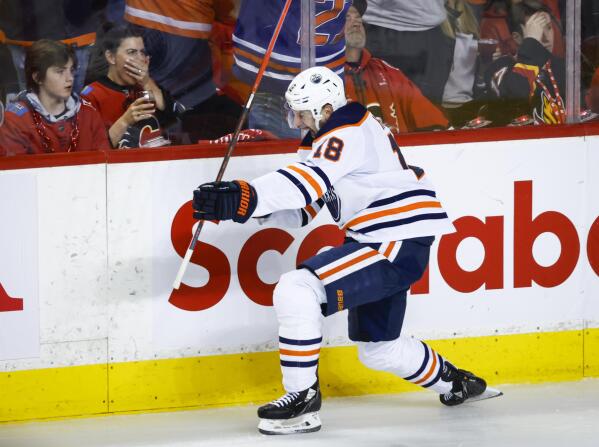 Edmonton Oilers winger Zach Hyman celebrates his goal against the Calgary Flames during the third period of Game 2 of an NHL hockey Stanley Cup playoffs second-round series Friday, May 20, 2022, in Calgary, Alberta. (Jeff McIntosh/The Canadian Press via AP)