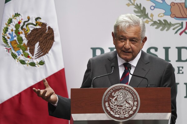 FILE - Mexican President Andres Manuel Obrador delivers a speech on economic figures, in Mexico City, April 12, 2022. (AP Photo/Marco Ugarte, File)