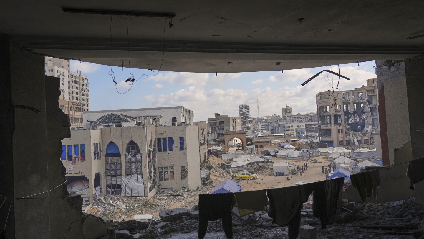 AP PHOTOS: A bombed-out Gaza university becomes a shelter for displaced Palestinians