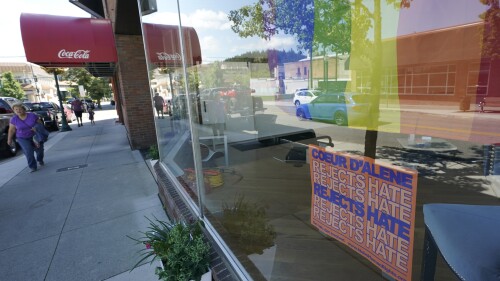 FILE - A sign that reads 