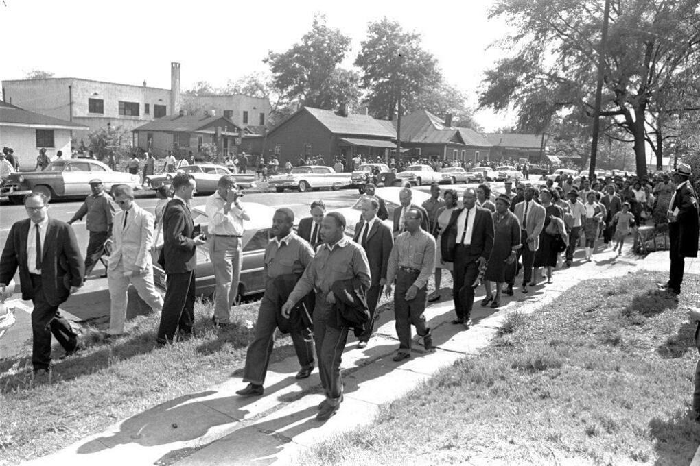 In this file photo taken April 12, 1963 Rev. Ralph Abernathy, left, and Rev. Martin Luther King Jr. lead a column of demonstrators as they attempt to march on Birmingham, Ala., City Hall. Arrested for leading a march against racial segregation in 1963, King Jr. spent days in solitary confinement writing his “Letter From Birmingham Jail,” which was smuggled out and stirred the world by explaining why Black people couldn't keep waiting for fair treatment. (AP Photo/Horace Cort)