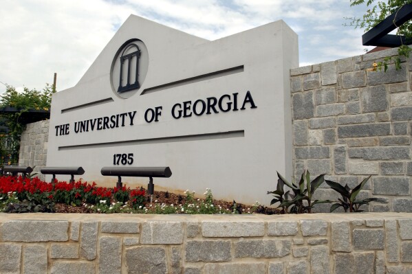 FILE - A sign for the University of Georgia is seen, May 28, 2004, in Athens, Ga. A woman was found dead Thursday, Feb. 22, 2024, on the campus of the University of Georgia after a friend told police she had not returned from a morning run, the university said. (AP Photo/Allen Sullivan, File)
