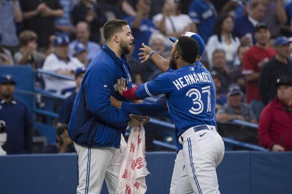 TORONTO, ON - SEPTEMBER 30: Toronto Blue Jays Right Field Teoscar Hernandez  (37) celebrates making the playoffs in the club house after the regular  season MLB game between the Boston Red Sox