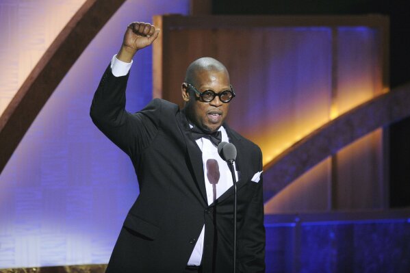 FILE - In this Jan. 16, 2010 file photo, media executive Andre Harrell speaks during the 2010 BET Hip Hop Honors in Washington. A tribute to Harrell, the late music executive who discovered Sean “Diddy” Combs and died earlier this month, will air Sunday on BET, BET Jams, BET Soul and REVOLT TV, where Harrell served as vice chairman.  (AP Photo/Nick Wass, File)