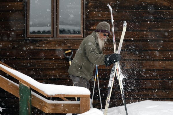 Billy Barr shakes snowfall disconnected his skis Wednesday, March 13, 2024, successful Gothic, Colo. (AP Photo/Brittany Peterson)