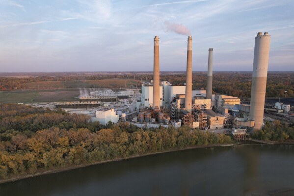 Steam rises from the AES Indiana Petersburg Generating Station, Wednesday, Oct. 25, 2023, in Petersburg, Ind. In a little more than five years – sometime in early 2029 – the world will likely be unable to stay below the internationally agreed temperature limit for global warming if it continues to burn fossil fuels at its current rate, a new study says. (AP Photo/Joshua A. Bickel)