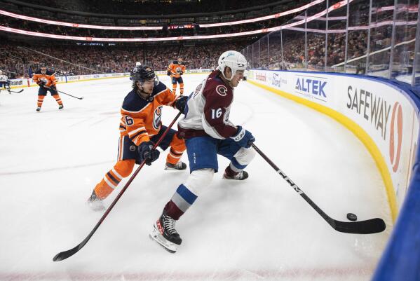Kane scores 3 as Oilers beat Avs 6-3, clinch playoff spot