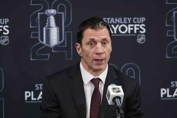 Carolina Hurricanes coach Rod Brind'Amour speaks during a news conference, April 25, 2024, in Elmont, N.Y. The Hurricanes have re-signed coach Brind'Amour and his staff to multiyear contracts, two people with knowledge of the moves told The Associated Press. The team has reached the playoffs and won at least a round in all six seasons since Brind'Amour took over. (AP Photo/Frank Franklin II)