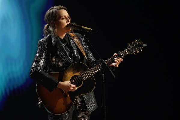 Brandi Carlile performs during the "In Memoriam" section of the 63rd Grammy Awards at the Los Angeles Convention Center, Tuesday, March 9, 2021. The awards show airs on March 14 with both live and prerecorded segments. (AP Photo/Chris Pizzello)