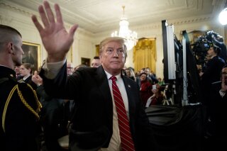 President Donald Trump departs following the 2019 Prison Reform Summit and First Step Act Celebration in the East Room of the White House in Washington, Monday, April 1, 2019. (AP Photo/Andrew Harnik)