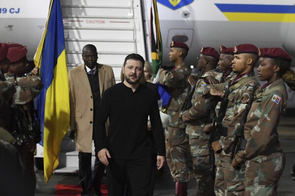 In this photo released by South African Government Communications and Information Services (GCIS), Ukrainian President Volodymyr Zelenskyy arrives in Pretoria, South Africa, for a state visit where he will meet South Africa's President Cyril Ramaphosa, Thursday, April 24, 2025. (AP Photo/GCIS via AP)
