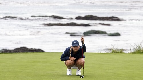 Bailey Tardy measure her putt on the ninth green during the second round of the U.S. Women's Open golf tournament at the Pebble Beach Golf Links, Friday, July 7, 2023, in Pebble Beach, Calif. (AP Photo/Darron Cummings)