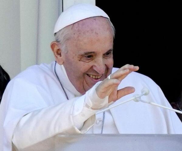 FILE - In this July 11, 2021 file photo, Pope Francis appears on a balcony of the Agostino Gemelli Polyclinic in Rome, where he is recovering from intestinal surgery, for the traditional Sunday blessing and Angelus prayer. Pope Francis left the hospital Wednesday, July 14, 2021, to continue his convalescence at the Vatican. (AP Photo/Alessandra Tarantino)