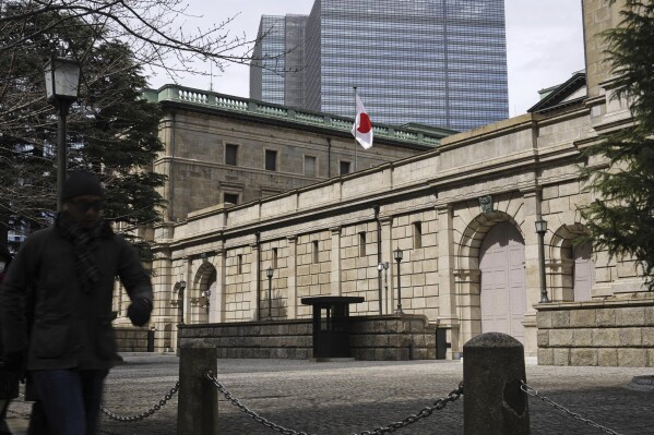 The headquarters of Bank of Japan (BOJ) is seen in Tokyo Tuesday, March 19, 2024. Japan’s central bank raised its benchmark interest rate Tuesday for the first time in 17 years, ending a longstanding policy of negative rates meant to boost the economy. (Kyodo News via AP)