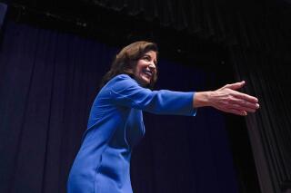 New York Governor Kathy Hochul goes to greet supporters during the New York State Democratic Convention in New York, Thursday, Feb. 17, 2022. (AP Photo/Seth Wenig)