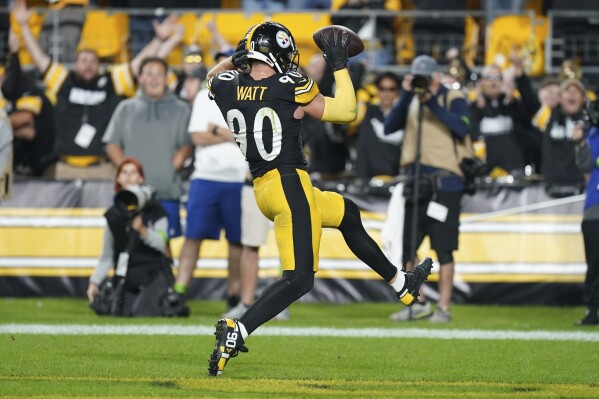 Pittsburgh Steelers linebacker T.J. Watt celebrates in the end zone after recovering a fumble by Cleveland Browns quarterback Deshaun Watson and returning it for a touchdown during the second half of an NFL football game Monday, Sept. 18, 2023, in Pittsburgh. (AP Photo/Matt Freed)