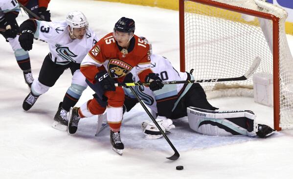 Chris Driedger of the Florida Panthers looks back on a score by
