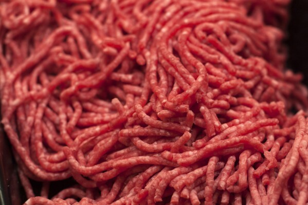 FILE - Ground beef is displayed for sale, April 1, 2017, at a market in Washington. Federal health officials said Tuesday, July 25, 2023, that ground beef contaminated with salmonella has sickened at least 16 people, including six hospitalized, in four Northeastern states. (AP Photo/J. Scott Applewhite, File)