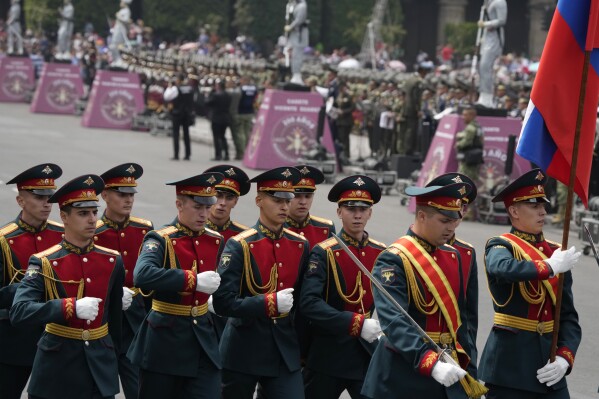A contingent of Russian soldiers march in the annual Independence Day military parade through the Zocalo of Mexico City, Saturday, Sept. 16, 2023. (AP Photo/Fernando Llano)