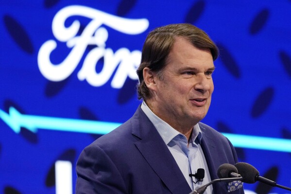 FILE - Ford Motor Co., President and CEO Jim Farley announces the automaker's new BlueOval Battery Park, Monday, Feb. 13, 2023, in Romulus, Mich. Ford's top executive says that last fall’s contentious United Auto Workers’ strike changed the company's relationship with the union to the point where it will “think carefully” about where it builds future vehicles. (AP Photo/Carlos Osorio, File)