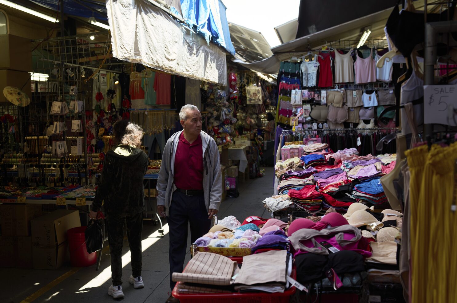 US inflation cools and Americans step up spending as they brace for tariff impact